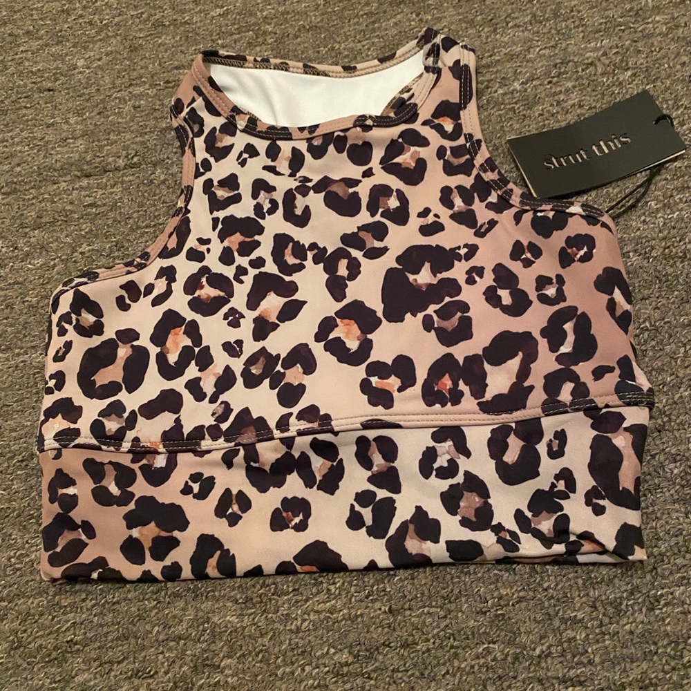 Brand new cheetah prints sports bra! Strut This brand and one size